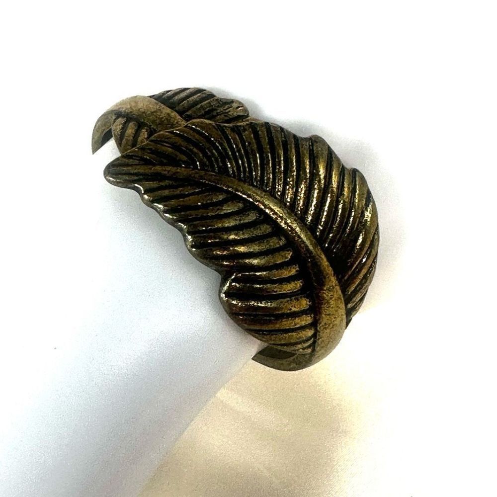 Brass tone leaf hinged bangle bracelet